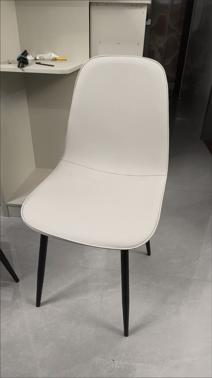 Contemporary Luxury Curved Faux Leather Iron Carbon Steel Dining Chair For Living Room