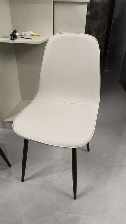 Contemporary Luxury Curved Faux Leather Iron Carbon Steel Dining Chair For Living Room