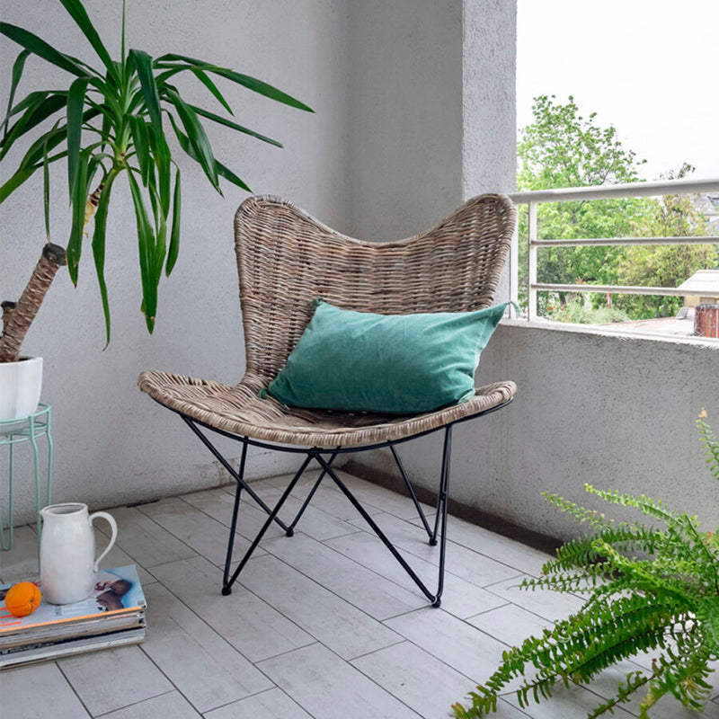 Contemporary Scandinavian Handwoven Rattan Lounge Chair - Accent Chair With Ergonomic Backrest & Iron Base For Boutique Indoor & Outdoor Spaces