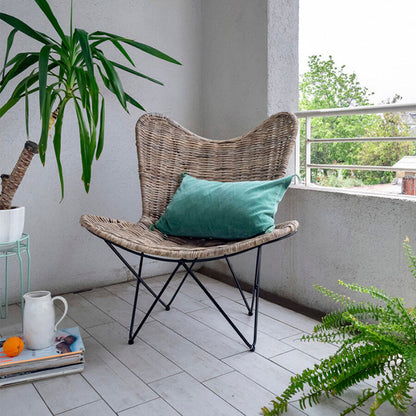 Contemporary Scandinavian Handwoven Rattan Lounge Chair - Accent Chair With Ergonomic Backrest & Iron Base For Boutique Indoor & Outdoor Spaces