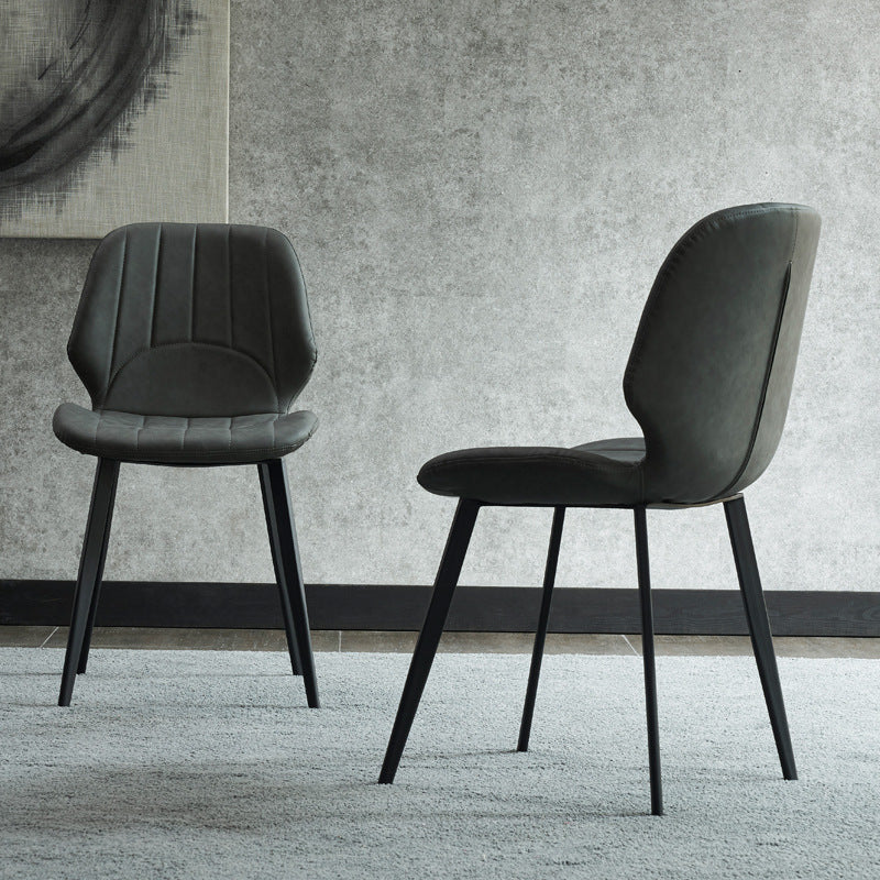 Contemporary Luxury PU Leather Plywood Carbon Steel Dining Chair Ribbed Backrest For Living Room
