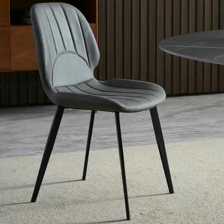 Contemporary Luxury PU Leather Plywood Carbon Steel Dining Chair Ribbed Backrest For Living Room