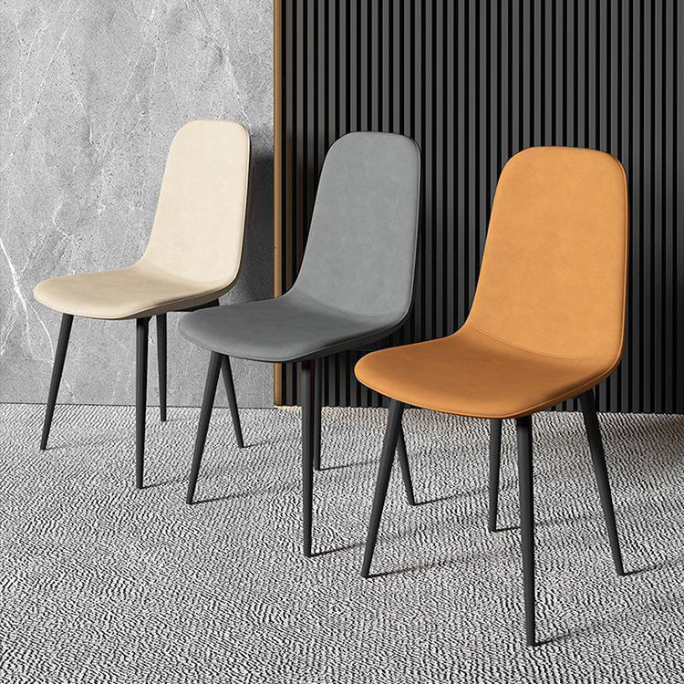 Contemporary Luxury Curved Faux Leather Iron Carbon Steel Dining Chair For Living Room