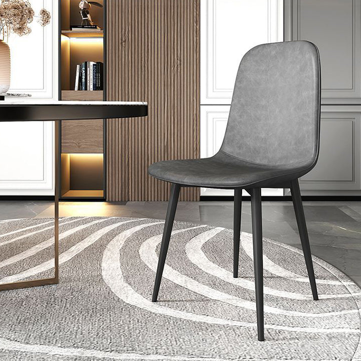 Contemporary Luxury Curved Faux Leather Iron Carbon Steel Dining Chair For Living Room